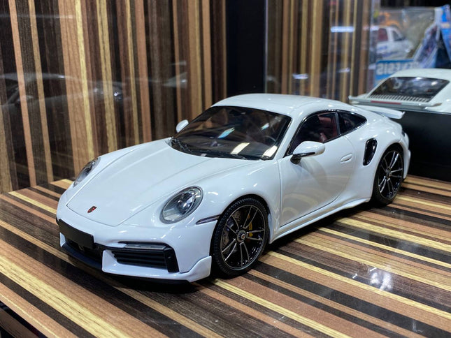 Minichamps 1/18 Porsche 911 Turbo S White All Opening Diecast Model - studio product photo of the scale model
