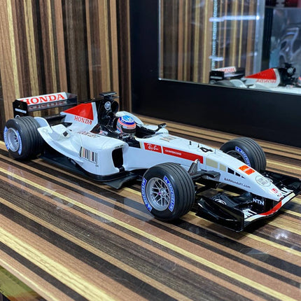 Minichamps 1/18 Honda B-A-R #4 T. Sato 2005 White/Red Diecast Model - studio product photo of the scale model