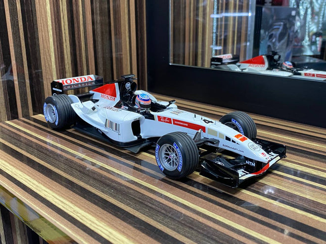 Minichamps 1/18 Honda B-A-R #4 T. Sato 2005 White/Red Diecast Model - studio product photo of the scale model