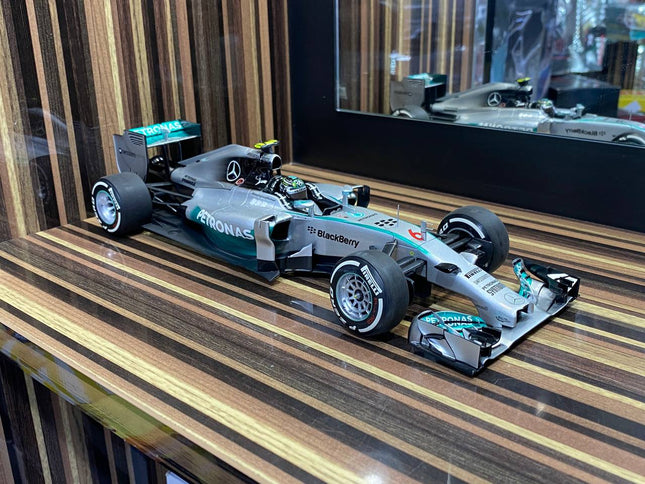 Minichamps Mercedes Benz AMG Petronas F1 Team W05 #6 N. Rosberg 2014 1:18 Diecast Model Car Silver - studio product photo of 