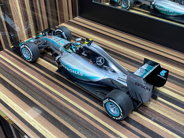 Minichamps Mercedes-Benz AMG Petronas F1 W06 Hybrid #6 N. Rosberg 2015 1/18 Diecast Model - studio product photo of the scale