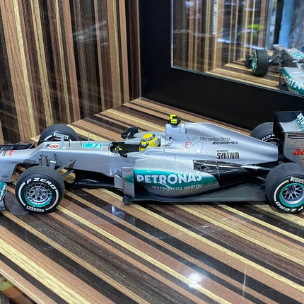 Minichamps Mercedes Benz AMG Petronas F1 W03 #8 N. Rosberg 2012 1:18 Diecast Silver - studio product photo of the scale model