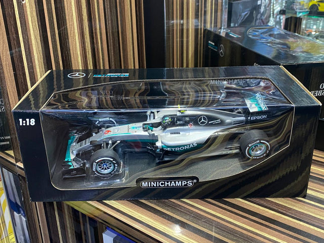 Minichamps Mercedes AMG Petronas F1 W06 Hybrid #6 N. Rosberg 2016 1/18 Diecast Silver - studio product photo of the scale mod