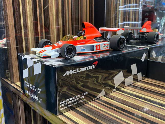 Minichamps McLaren Ford M23 #11 J. Hunt 1976 1/18 Diecast Model - studio product photo of the scale model