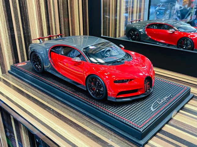 MR Collection Models Bugatti Chiron Sport 1/18 Red/Carbon Resin Model Car - studio product photo of the scale model
