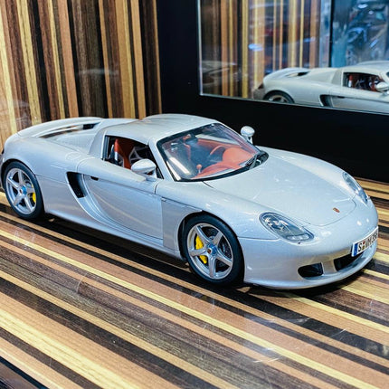 AutoArt Porsche Carrera GT Silver 1:18 Diecast Model Car - studio product photo of the scale model