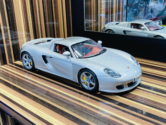 AutoArt Porsche Carrera GT Silver 1:18 Diecast Model Car - studio product photo of the scale model