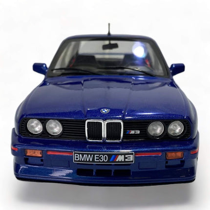 Solido 1:18 Diecast BMW M3 E30 Blue Model Car - studio product photo of the scale model