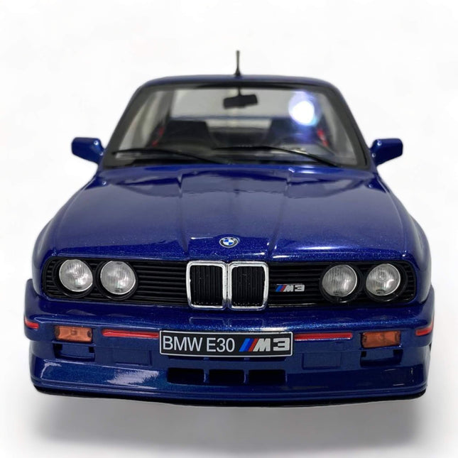 Solido 1:18 Diecast BMW M3 E30 Blue Model Car - studio product photo of the scale model
