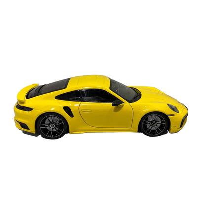 Minichamps Porsche 911 (992) Turbo S Coupe Sport Design 1:18 Yellow 2021 - collectible scale model car
