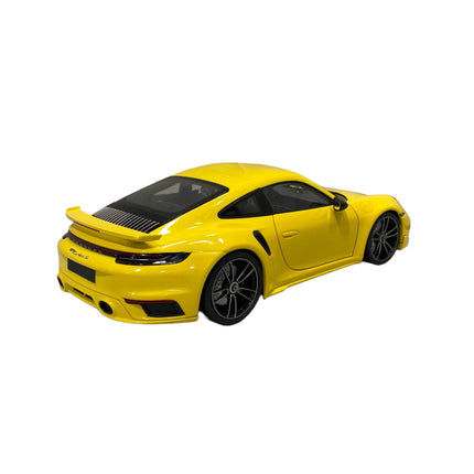 Minichamps Porsche 911 (992) Turbo S Coupe Sport Design 1:18 Yellow 2021 - fine detailed model replica