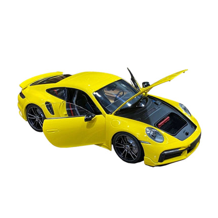 Minichamps Porsche 911 (992) Turbo S Coupe Sport Design 1:18 Yellow 2021 - detailed die-cast style model