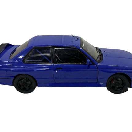 Solido BMW M3 E30 1:18 Blue Diecast Model Car - studio product photo of the scale model