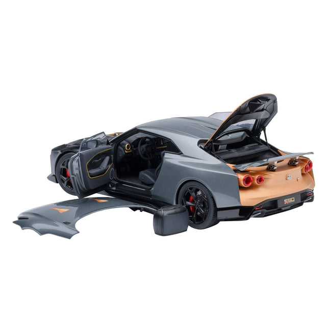 https://cdn.shopify.com/s/files/1/0504/9925/6496/files/nissan-gt-r50-by-italdesign-goodwood-version-liquid-kinetic-gray-metallic-with-gold-accents-118-model-car-by-autoart-503853.jpg?v=1756087277