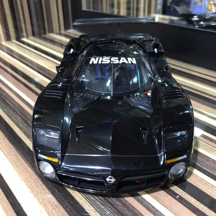 AutoArt Nissan R390 GTI 1998 Black 1:18 Diecast Model Car - studio product photo of the scale model