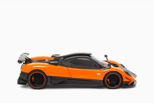 https://www.mydiecastcars.com/wp-content/uploads/2023/08/pagani-zonda-cinque-orange-almost-real-2.jpg