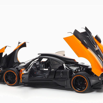 https://www.mydiecastcars.com/wp-content/uploads/2023/08/pagani-zonda-cinque-orange-almost-real-3.jpg