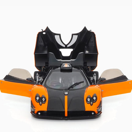 https://www.mydiecastcars.com/wp-content/uploads/2023/08/pagani-zonda-cinque-orange-almost-real-4.jpg
