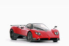 https://www.mydiecastcars.com/wp-content/uploads/2023/12/pagani-zonda-f-red-almost-real-1w.jpg