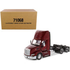 https://cdn.shopify.com/s/files/1/0504/9925/6496/products/peterbilt-579-day-cab-truck-tractor-legendary-red-transport-series-150-diecast-model-by-diecast-masters-418666.jpg?v=1748421193