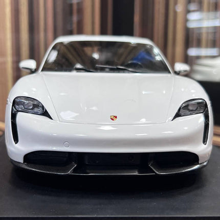 Minichamps Porsche Taycan 1:18 Resin Diecast Model Car White - studio product photo of the scale model
