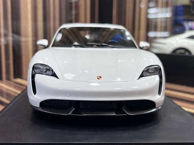 Minichamps Porsche Taycan 1:18 Resin Diecast Model Car White - studio product photo of the scale model
