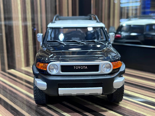 AutoArt Toyota FJ Cruiser Black 1:18 Diecast Model Car - studio product photo of the scale model