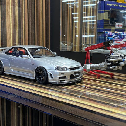 MotorHelix 1:18 Nissan Skyline GT-R R34 Nismo Z-Tune Silver Diecast Model - detailed collector display model