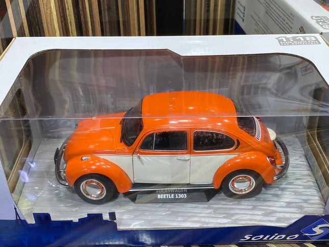 Solido 1:18 Volkswagen Beetle 1303 Orange Resin Model Car - studio product photo of the scale model