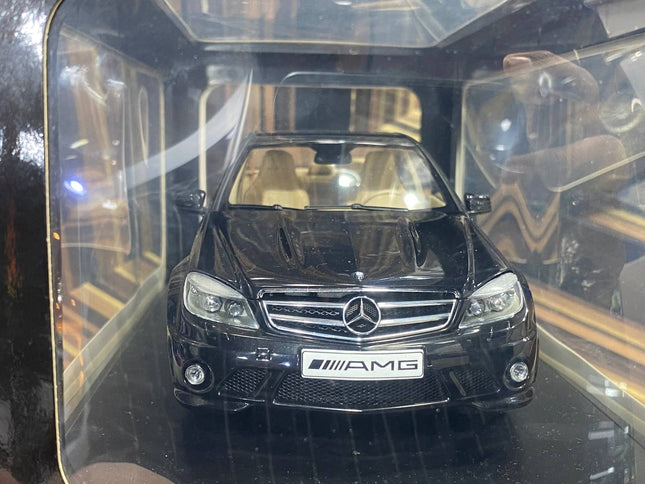AutoArt Mercedes-Benz C63 AMG Black 1:18 Diecast Model Car - studio product photo of the scale model