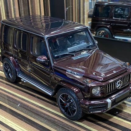Minichamps 1:18 Mercedes-Benz AMG G63 2018 Brown Diecast Model Car - studio product photo of the scale model