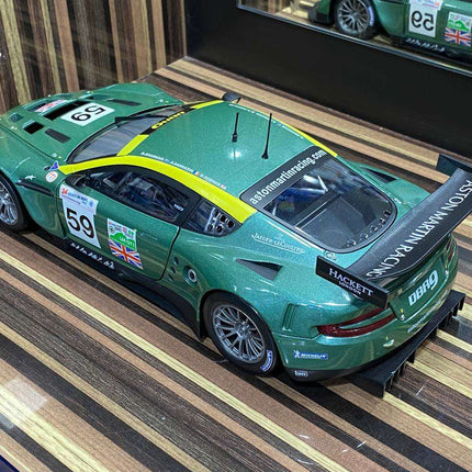 Solido 1:18 Aston Martin DBR9 Racing #59 Green Diecast Model Car - studio product photo of the scale model