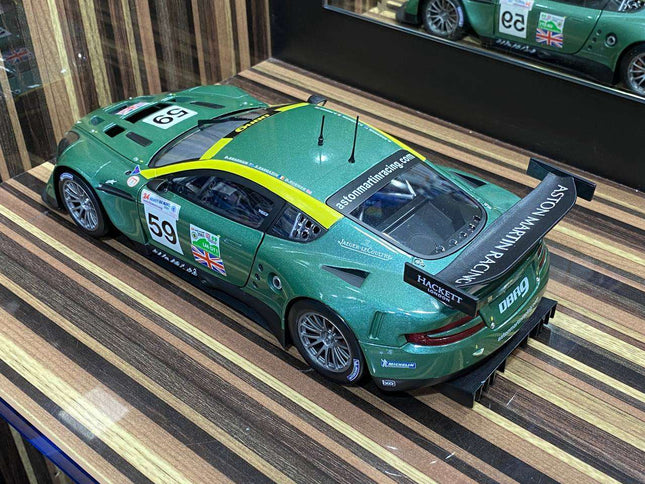 Solido 1:18 Aston Martin DBR9 Racing #59 Green Diecast Model Car - studio product photo of the scale model