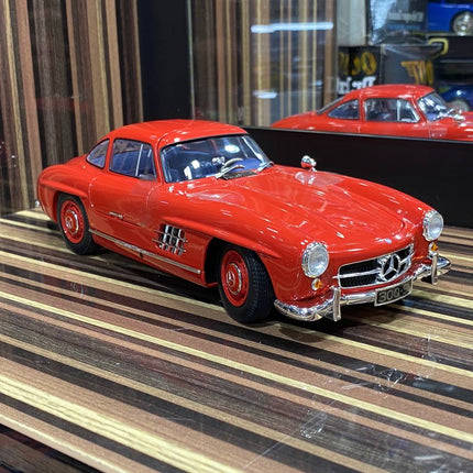 Minichamps 1/18 Mercedes-Benz 300SL Red Diecast Model Car - studio product photo of the scale model