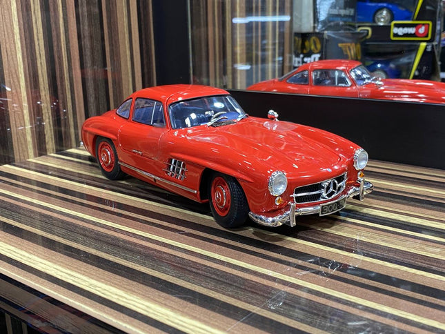 Minichamps 1/18 Mercedes-Benz 300SL Red Diecast Model Car - studio product photo of the scale model
