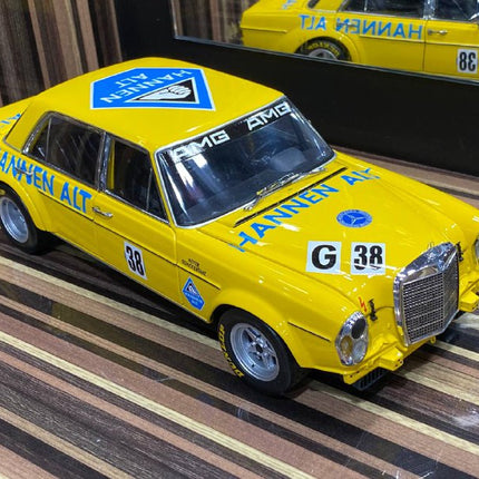Minichamps 1/18 Mercedes-Benz 300SEL 1971 Yellow Diecast Model - studio product photo of the scale model