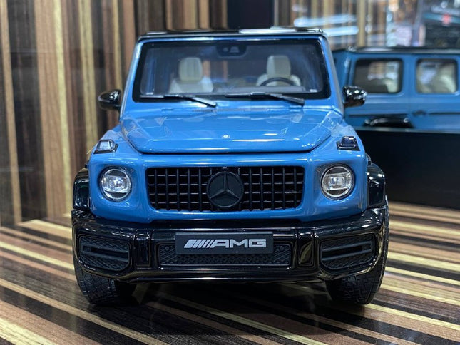 Minichamps 1/18 Mercedes-Benz G 63 AMG Blue Diecast Model Car - studio product photo of the scale model
