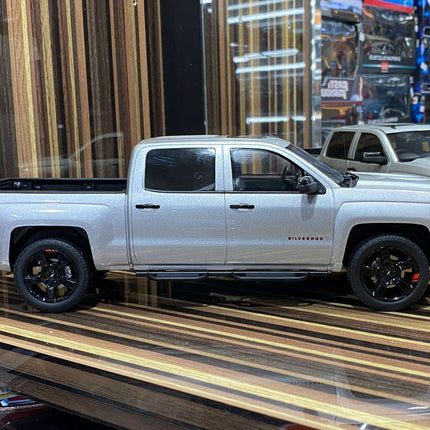 GT Spirit Chevrolet Silverado 1:18 Resin Scale Model Car Silver - studio product photo of the scale model