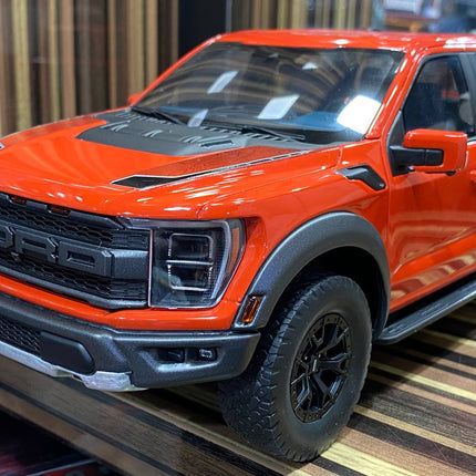 GT Spirit 1:18 Ford F-150 Raptor Orange Resin Model - studio product photo of the scale model