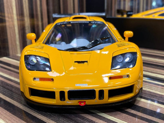 Solido McLaren F1 GTR Short-Tail 1:18 Yellow Diecast Model Car - studio product photo of the scale model