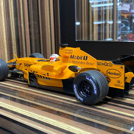 Minichamps McLaren Mercedes MP4-21 Kimi Raikkonen 2006 1:18 Diecast Model Orange - showroom-quality model replica