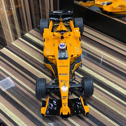 Minichamps McLaren Mercedes MP4-21 Kimi Raikkonen 2006 1:18 Diecast Model Orange - scale model collectible piece