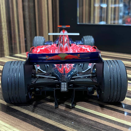1/18 Toro Rosso Cosworth STR1 V. Liuzzi 2006 Formula 1 Blue/Red by Minichamps - collectible scale model car