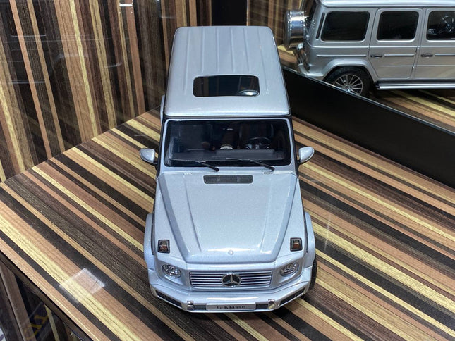 Minichamps 1/18 Mercedes-Benz G-Class 2018 Silver Diecast Model Car - studio product photo of the scale model