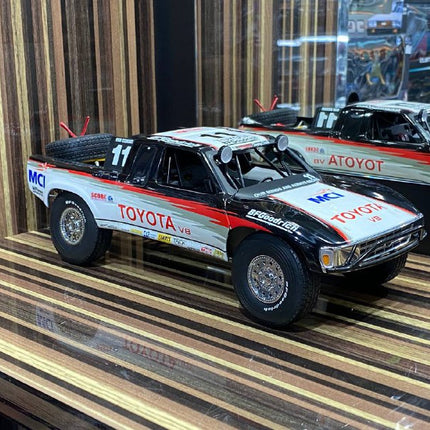AutoArt Toyota Trophy Truck #11 White and Black 1:18 Diecast Model Truck - detailed collector display model