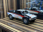 AutoArt Toyota Trophy Truck #11 White and Black 1:18 Diecast Model Truck - detailed collector display model