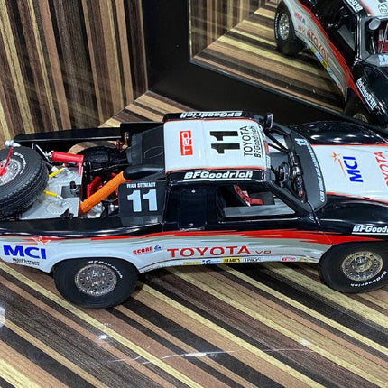 AutoArt Toyota Trophy Truck #11 White and Black 1:18 Diecast Model Truck - collectible scale model car