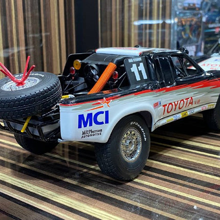 AutoArt Toyota Trophy Truck #11 White and Black 1:18 Diecast Model Truck - premium collector scale model