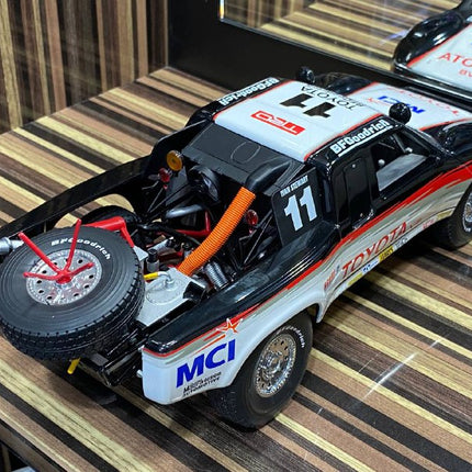 AutoArt Toyota Trophy Truck #11 White and Black 1:18 Diecast Model Truck - scale model for display