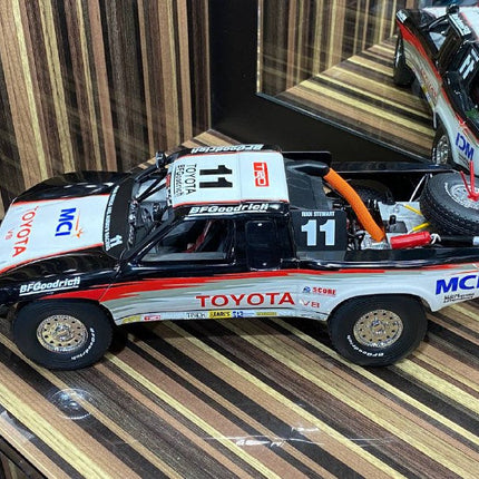 AutoArt Toyota Trophy Truck #11 White and Black 1:18 Diecast Model Truck - scale model collectible piece